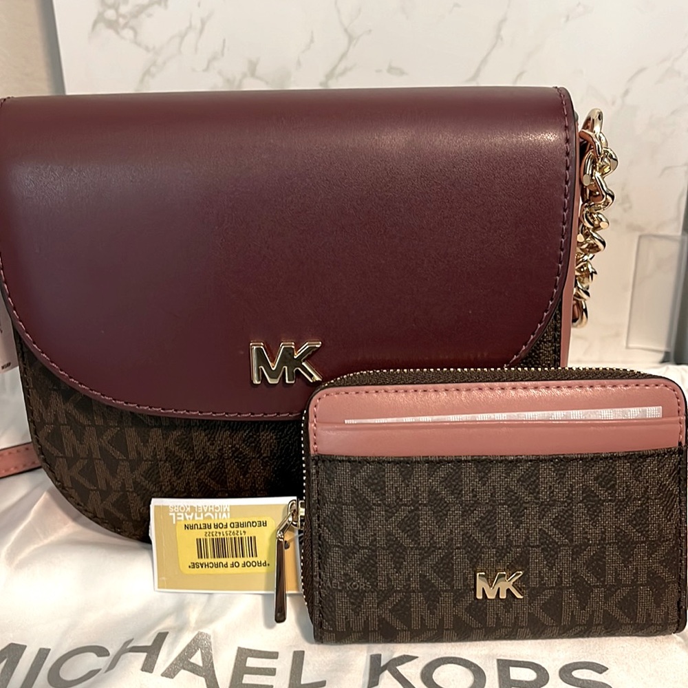 New Michael Kors crossbody handbag. Comes with wallet.